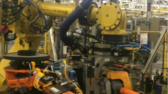 ATI机器人工具快换装置在独立盖板和气动驱动的碎屑防护罩的应用